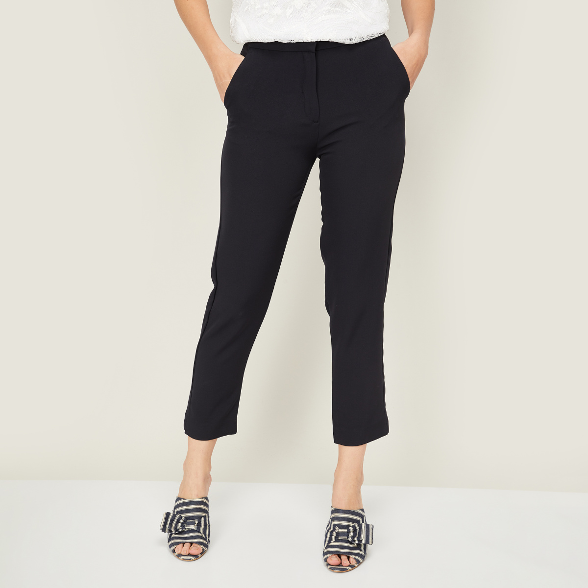 AND Women Solid Cropped Casual Trousers